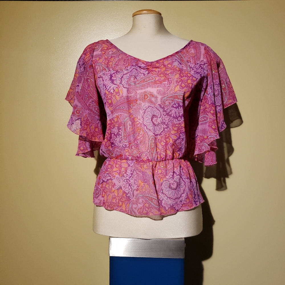 Butterfly cut blouse.